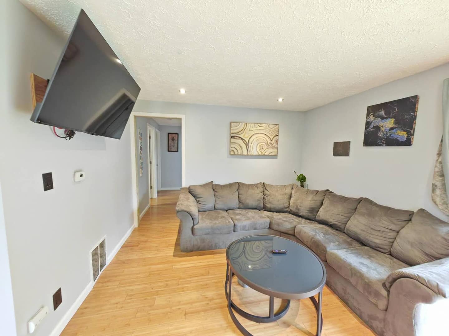 The living room with sofas and a coffee table